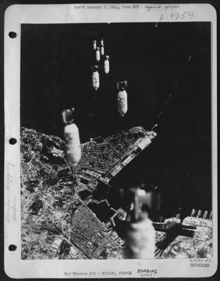 Bombs from Flying Fortresses fall on Toulon in a raid 24 November.