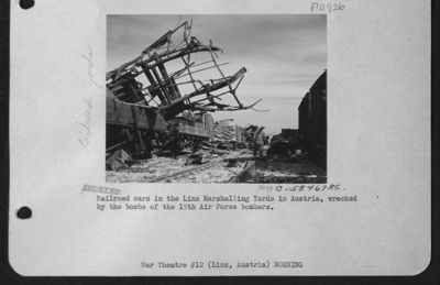 Railroad Cars In The Marshalling Yards Of Linz, Austria, Wrecked By The Bombs Of The 15Th Air Force Bombers.