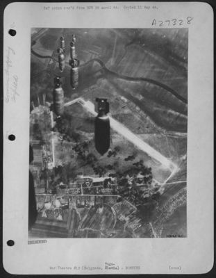 Shown here are bombs dropping from the Flying Fortresses and Liberators of the 15th AAF during the aerial assault on the Belgrade-Zemun airdrome on 16 April 1944. Hits were scored on runways, shops, and barracks. A few bombs extended into the near