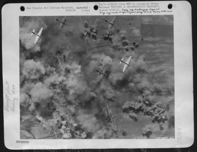 Target, hits, and bombers - they're all plainly in the picture - made while a formation of B-17 Flying Fortresses of the U.S. Army 15th AF dropped a deadly load of bombs on the important Nazi aircraft factory at Weiner Neustadt, south of Vienna, Austria.