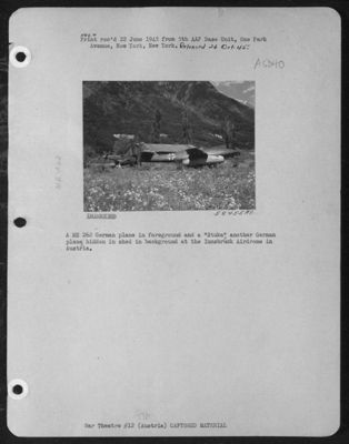A Me 262 German Plane In Foreground And A "Stuka" , Another German Plane, Hidden In Shed In Background At The Innsbruck Airdrome In Austria.