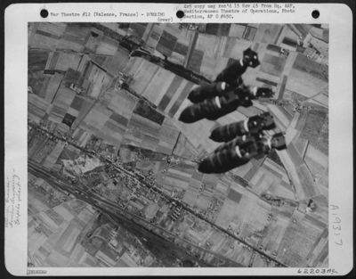 Tons Of Bombs Released By Boeing B-17 Flying Fortresses Of The 15Th Air Force Fall Earthward To Deal Destruction Upon The Torpedo Factory At Valence, France.