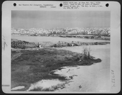 Yugoslavia-Twin Sava river railroad bridges at Belgrade, "White City" of the Partisan Yugoslavs, seen here after 15th AF attacks 3, 6, and 8 Sept. 1944, by Flying Fortresses and Liberators.