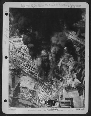 SYNTHETIC PLANT AT BRUX---Black smoke from the many fires started in the synthetic oil plant at Brux belches skyward as U.S. Eighth AAF heavy bombers launched a heavy attack there 12 May 44. A huge explosion was reported during the height of the