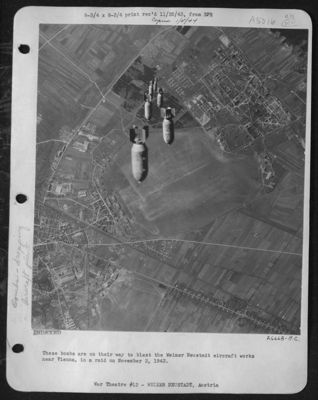 These bombs are on their way to blast the Weiner Neustadt aircraft works near Vienna in a raid on November 2.