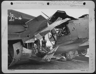 This plane received a direct hit by flak over Debreczen rail yards, Hungary, on Sept 21, 1944. The pilot, 2d Lt. Guy M. Miller, of Lakeside, Calif., and Co-pilot, 2d Lt. Thomas M. Rybovich, West Palm Beach, Fla., were able to bring her back to base.