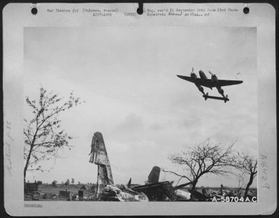 A Lockheed P-38 Lightning Buzzes The Field At Valence, France. 8 October 1944.