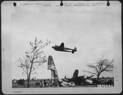 A Lockheed P-38 Lightning Buzzes The Field At Valence, France. 8 October 1944.