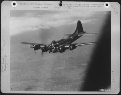 HUNGARY--After completing it's bomb run over Budapest Farencvaros Railroad yards on 14 July 1944, this Boeing B-17 Flying Fortress was the victim of a direct hit by flak. Five of the crew were seen to have bailed out, and the plane crashed