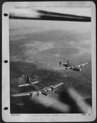 ITALY-A Consolidated B-24 Liberator and a Boeing B-17 Flying Fortress, both of the 15th Air Force fly in the same formation when they return from an attack against targets in Vienna on October 7, 1944.