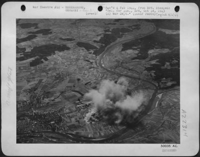 FIRE AT A BEND OF THE "BLUE" DANUBE: Tucked away in a bend of the Danube near the Austrian border at Regensburg, the Germans had built a mammoth aircraft factory which produced their latest type fighter, the ME 109G. On August 17th, a large