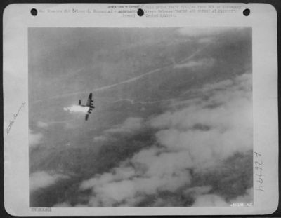 CAUSE AND EFFECT AT PLOESTI. May 5th 1944 raid of the oil refineries and railroad marshalling yards of the heavily defended city of Ploesti, Rumania, by Flying Fortress and Liberator bombers of the U.S. Army 15th Air Force. This is one fo the planes