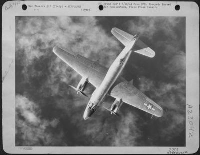 Looking Like A Scale Model, Suspended In Artificial Surroundings, This Martin B-26 Marauder Of Major General Cannon'S 1St Tact. AF Heads Out Across The Sea, Above The Clouds, After Successfully Attacking Fuel Storage Facilities At Savona, Italy, As Medite